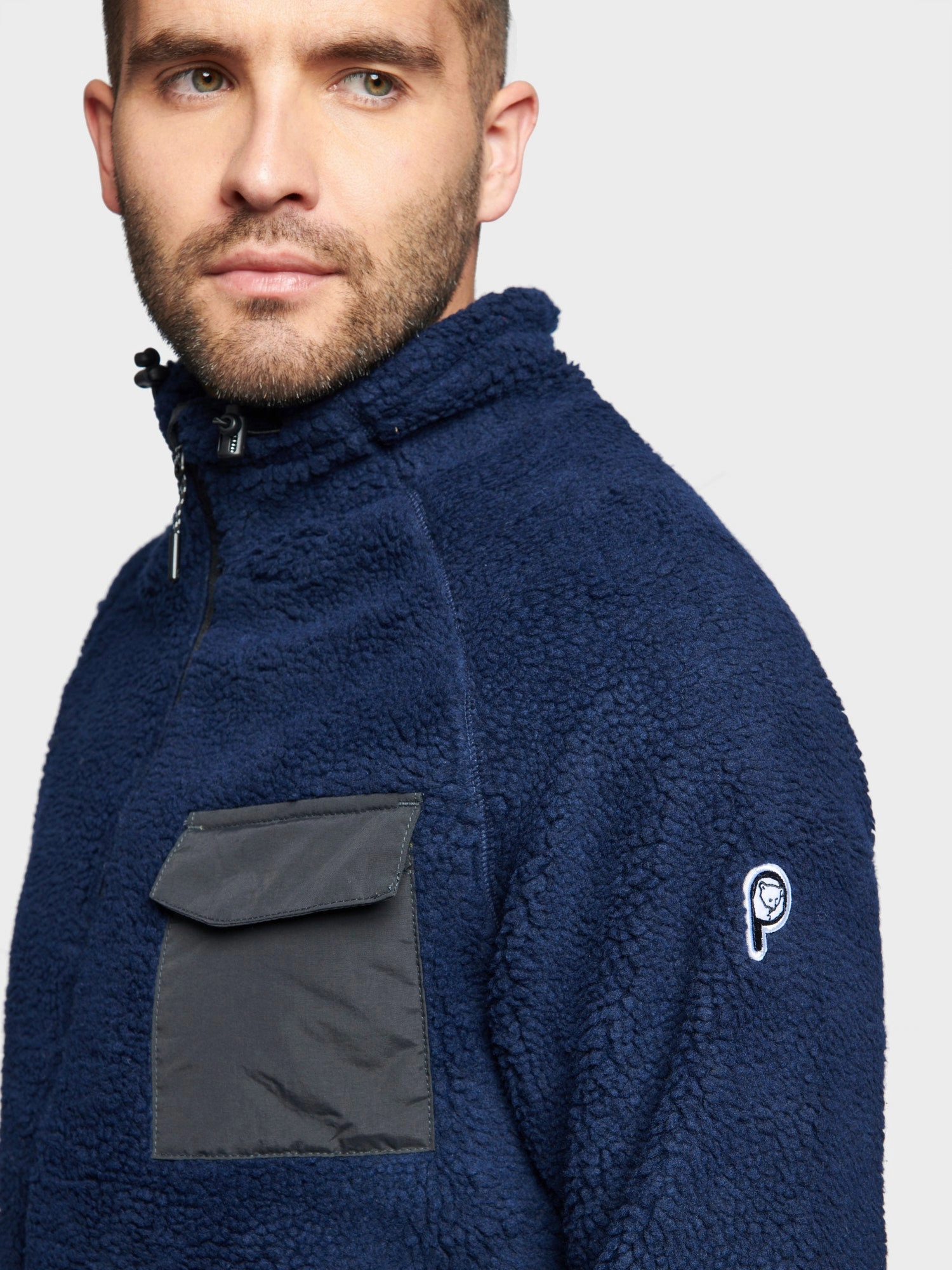 Flexible Side Gussets FullLengthZip Angled Pocket Fleece Jacket in Navy Blue