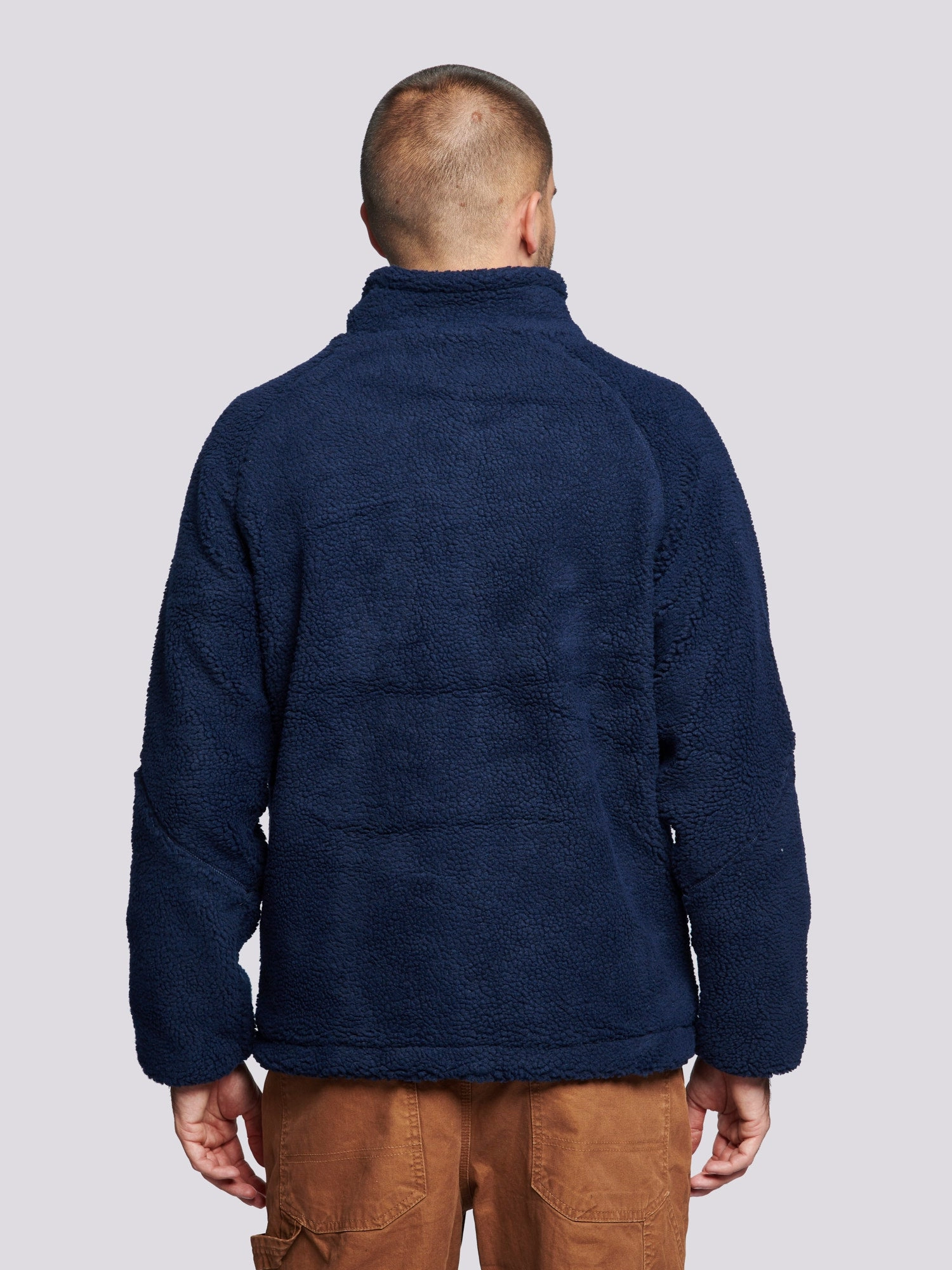 Angled Pocket Fleece Jacket in Navy Blue Crisp Clean Fit Flexible Hem Adjustment