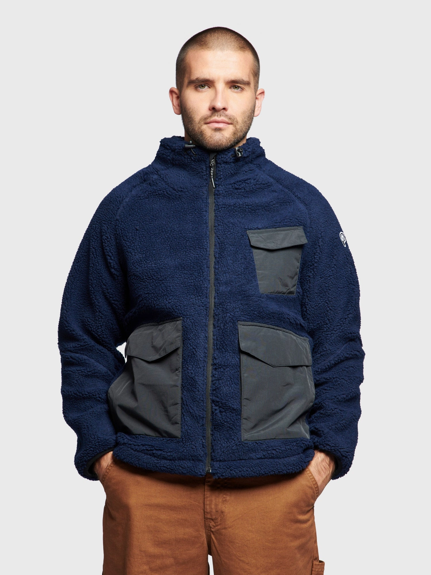 Soft Shell Nylon Cover Angled Pocket Fleece Jacket in Navy Blue