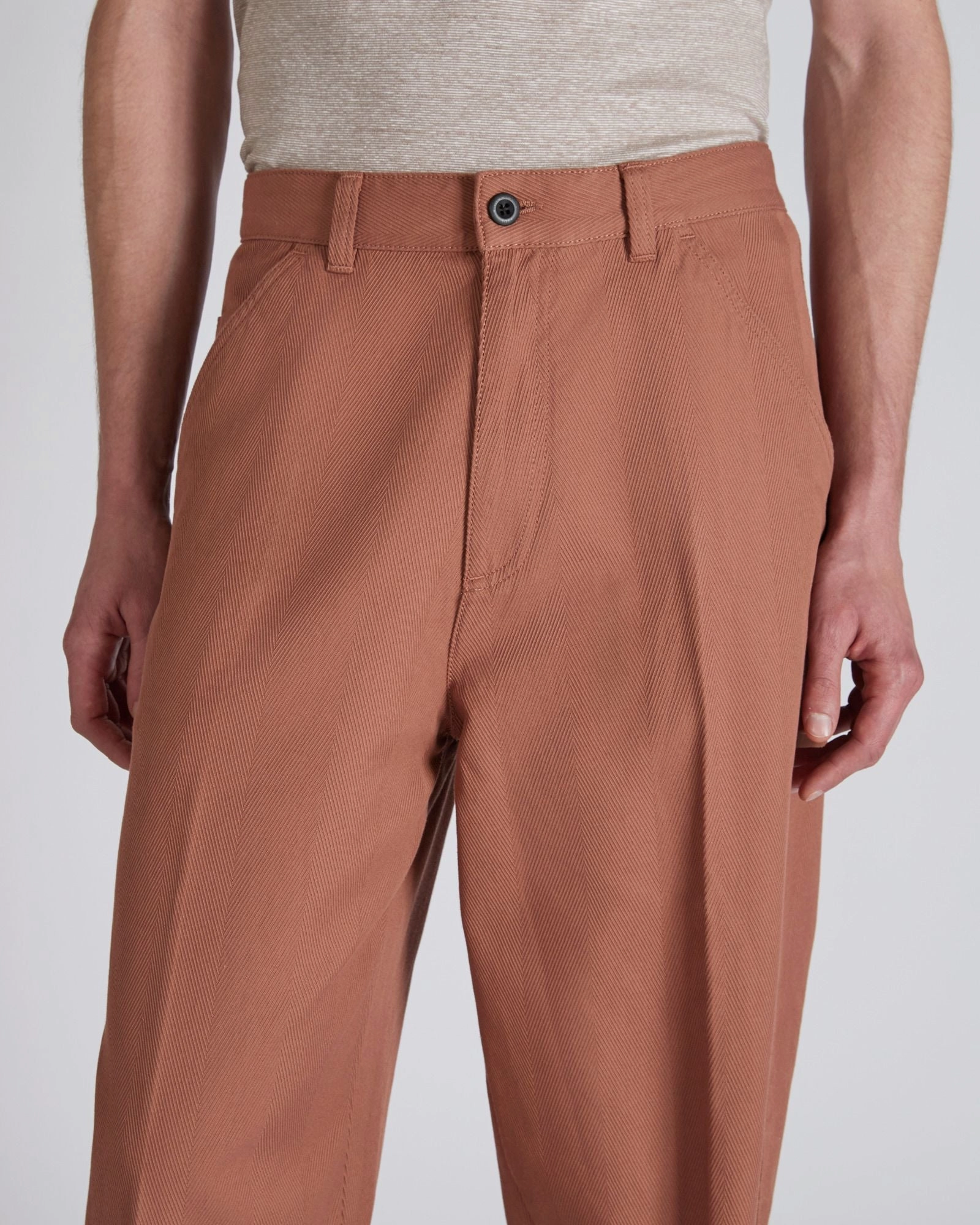 Carrot-fit cotton herringbone trousers Flexible Layer Fit