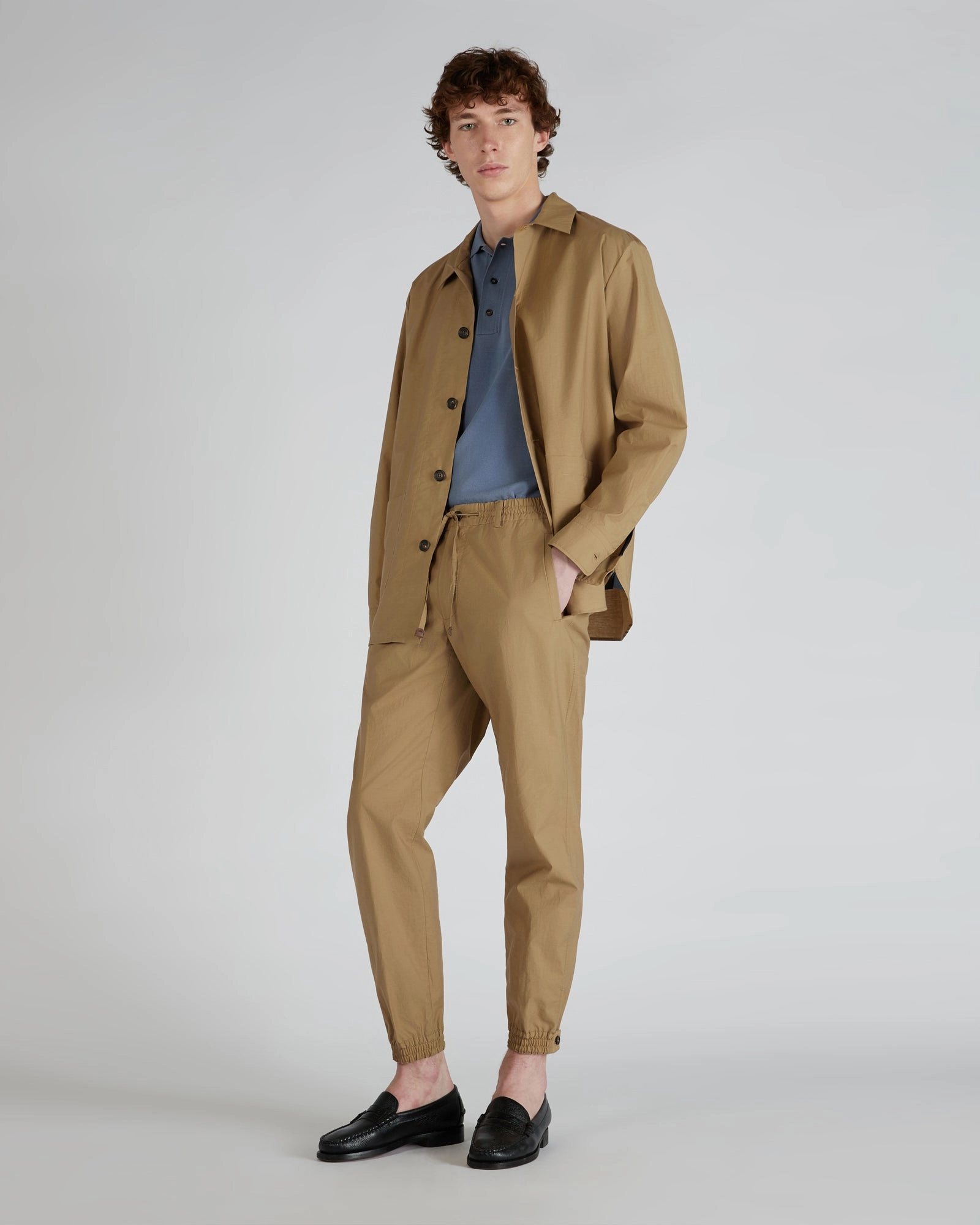 BreathableMaterial Tapered-fit cotton and technical fabric trousers