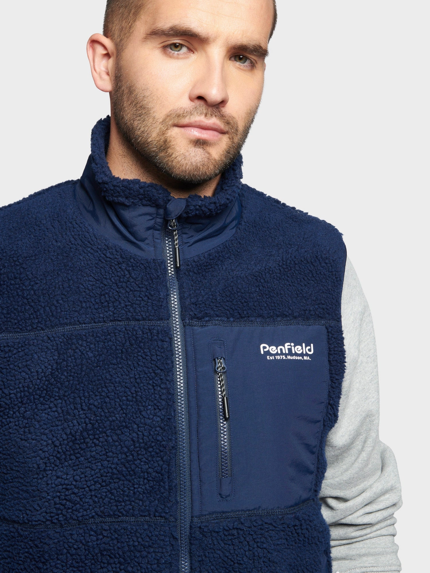 Stowable Hood SoftshellTexture Hudson Script Fleece Vest in Navy Blue