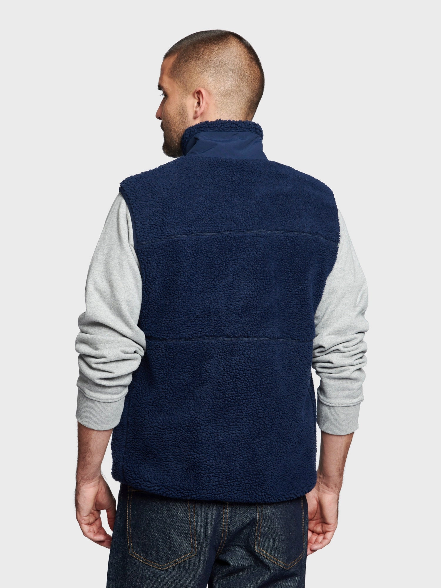 TapedSeamConstruction Hudson Script Fleece Vest in Navy Blue