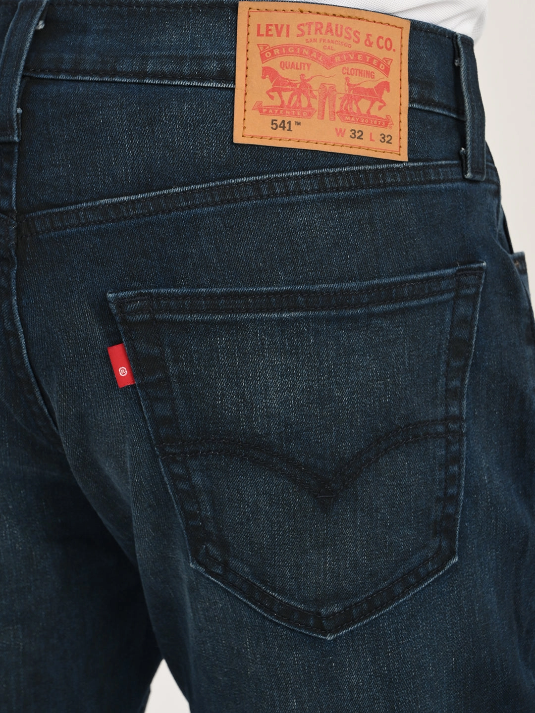 Men's 541 Dark Blue Athletic Tapered Fit Mid Rise Jeans Modern Minimalist Creative Look Raw Hem Design